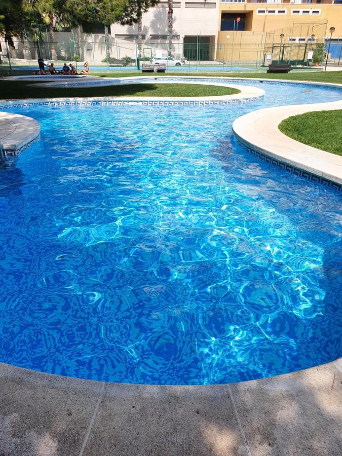 Apartment In Campoamor Overlooking The Swimming Pool Eksteriør billede