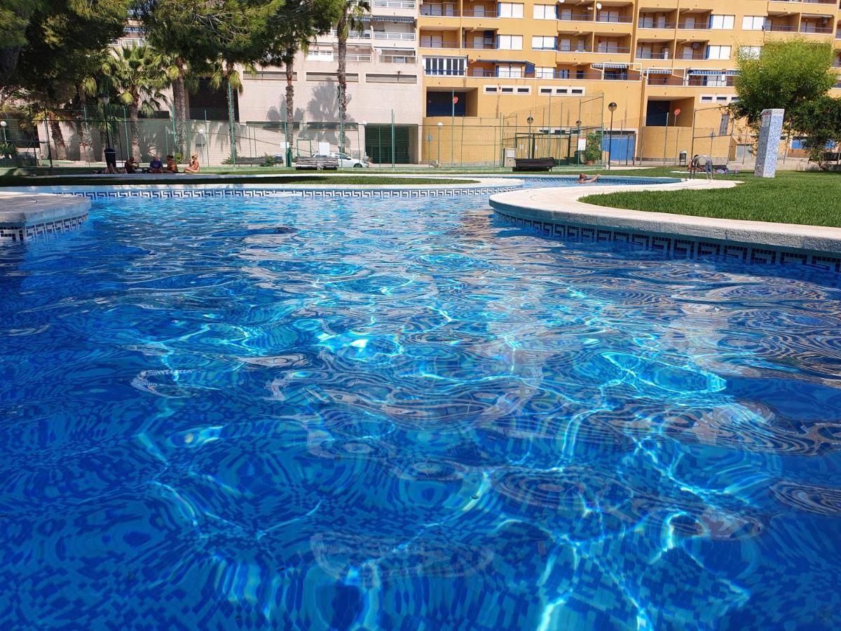 Apartment In Campoamor Overlooking The Swimming Pool Eksteriør billede