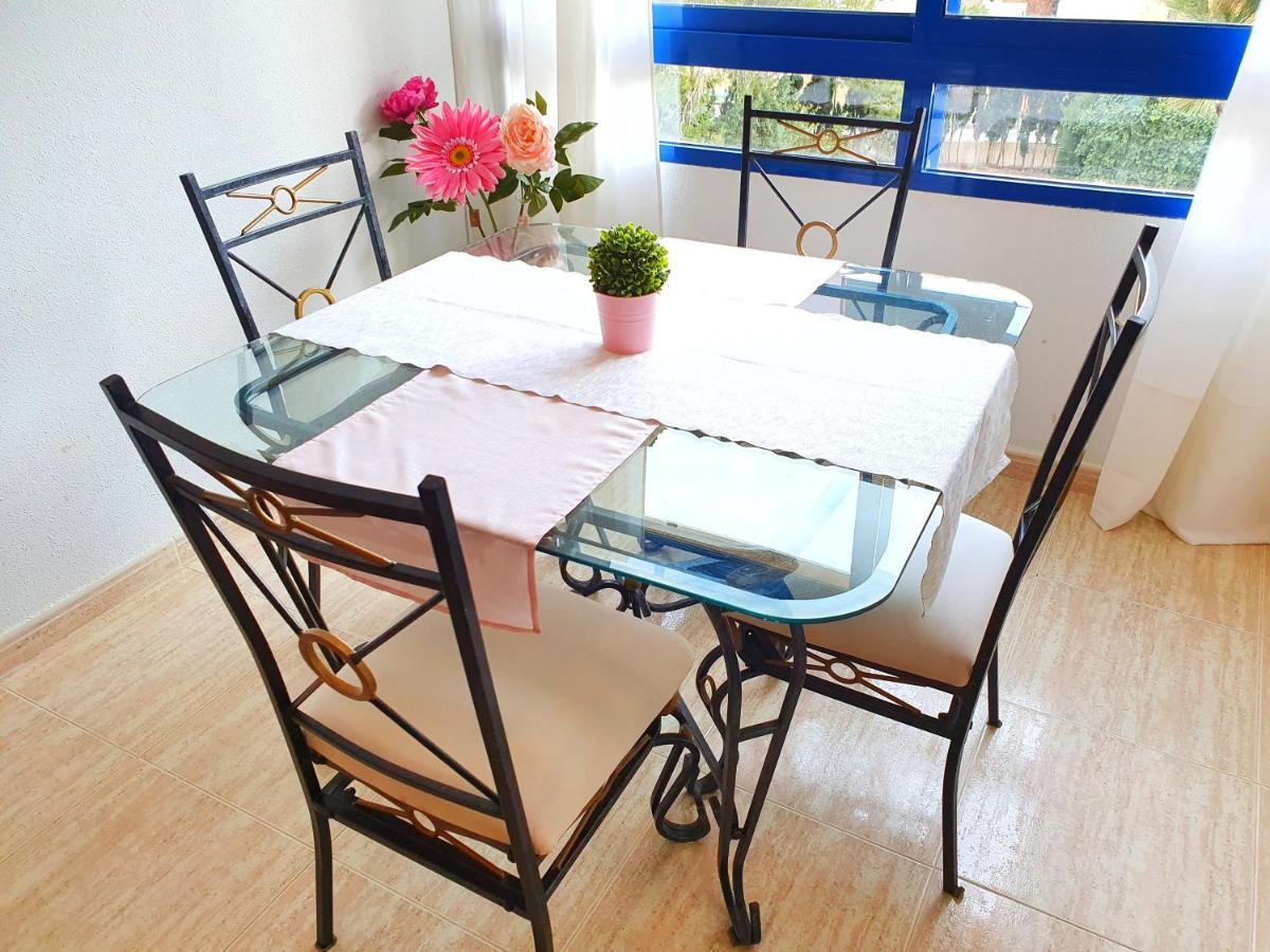 Apartment In Campoamor Overlooking The Swimming Pool Eksteriør billede