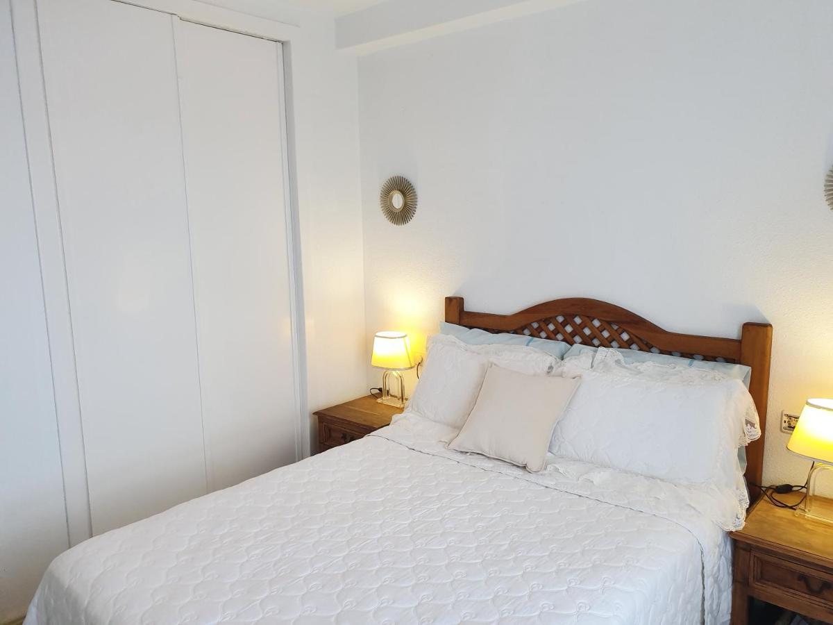 Apartment In Campoamor Overlooking The Swimming Pool Eksteriør billede