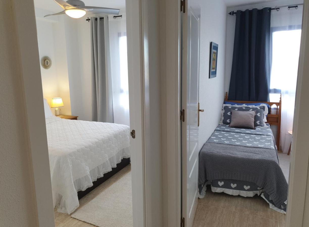 Apartment In Campoamor Overlooking The Swimming Pool Eksteriør billede