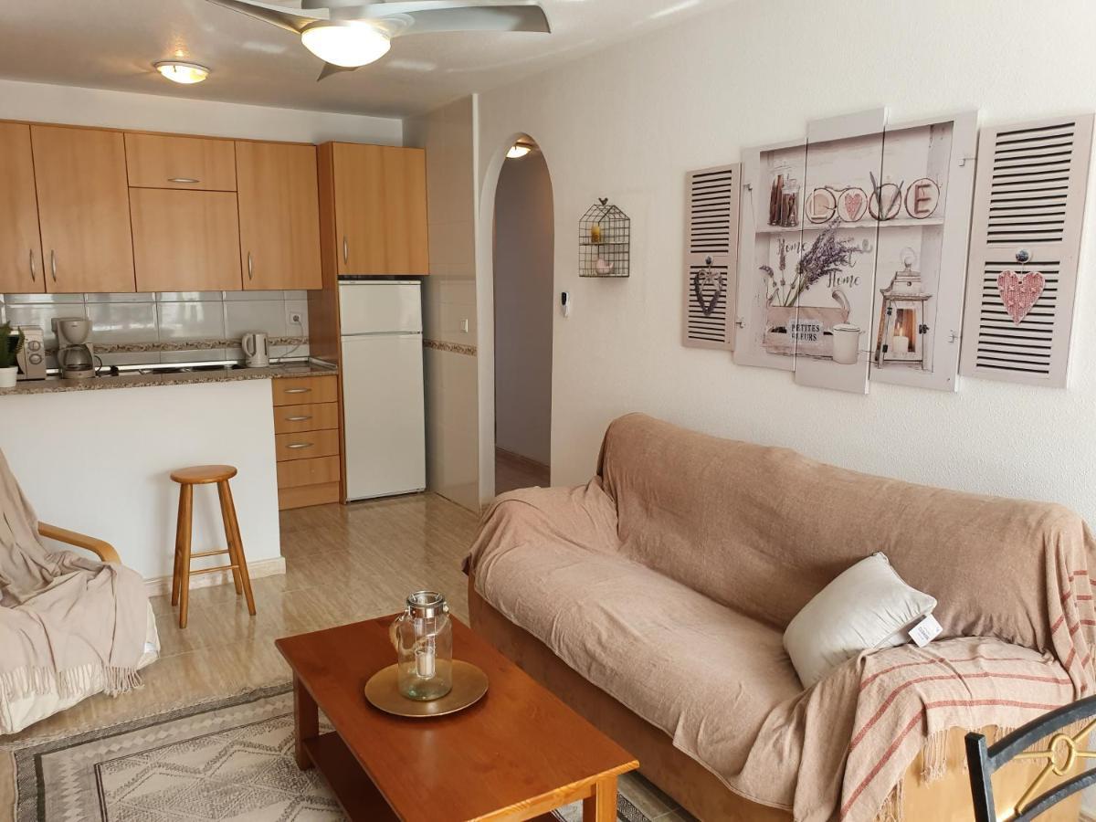 Apartment In Campoamor Overlooking The Swimming Pool Eksteriør billede
