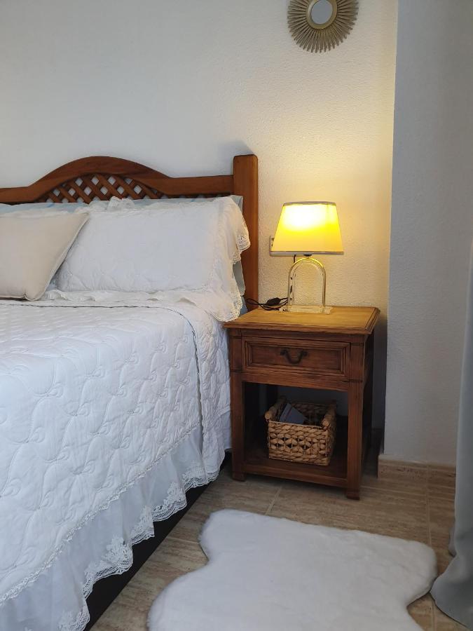 Apartment In Campoamor Overlooking The Swimming Pool Eksteriør billede