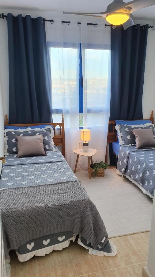 Apartment In Campoamor Overlooking The Swimming Pool Eksteriør billede