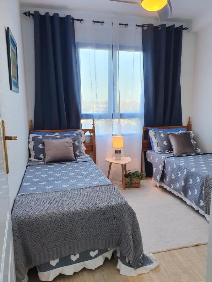 Apartment In Campoamor Overlooking The Swimming Pool Eksteriør billede