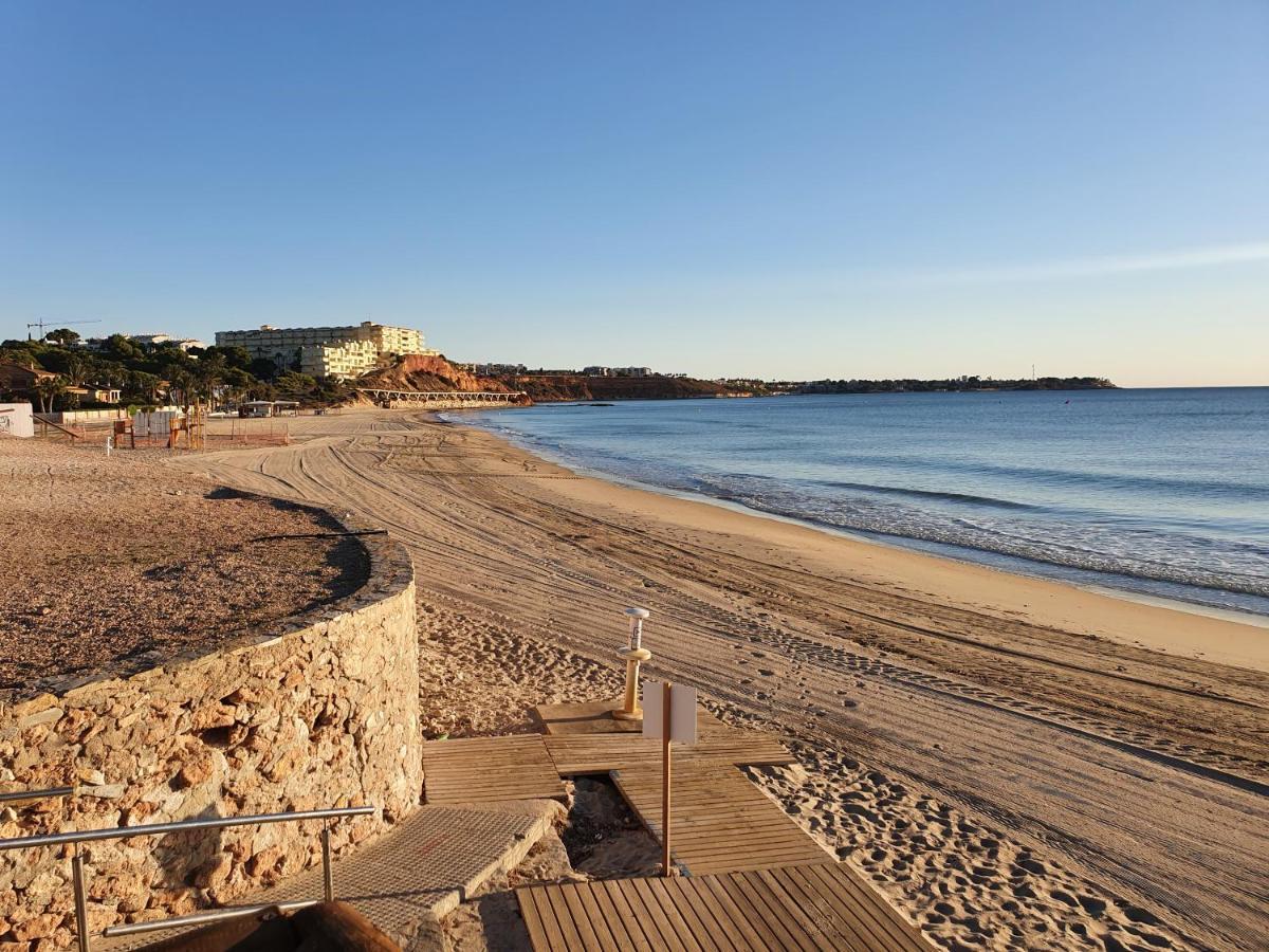 Apartment In Campoamor Overlooking The Swimming Pool Eksteriør billede