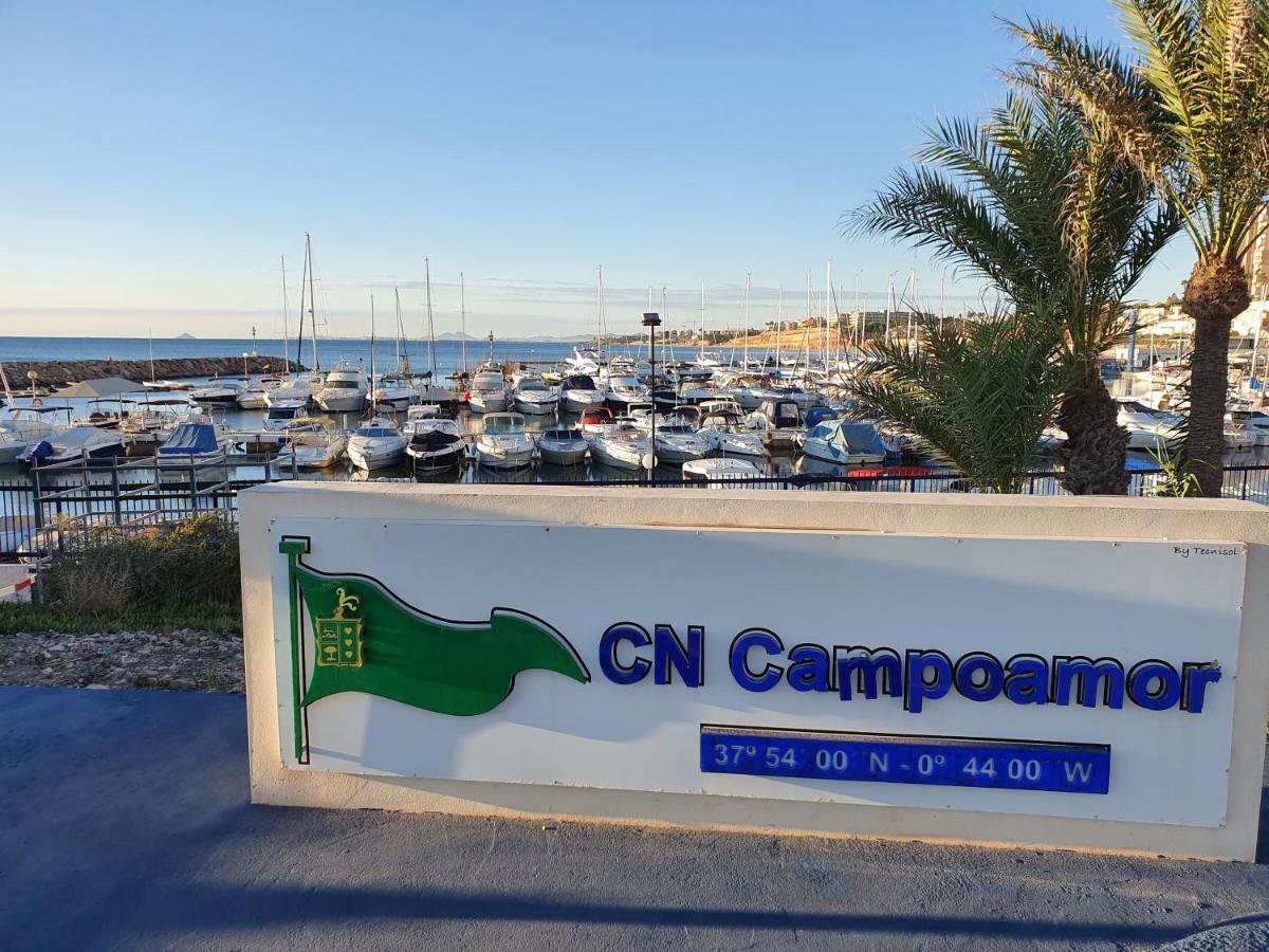 Apartment In Campoamor Overlooking The Swimming Pool Eksteriør billede