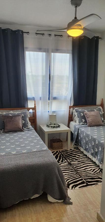 Apartment In Campoamor Overlooking The Swimming Pool Eksteriør billede