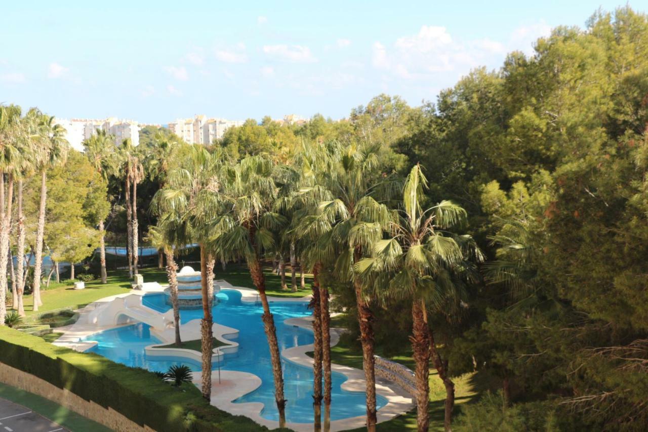 Apartment In Campoamor Overlooking The Swimming Pool Eksteriør billede